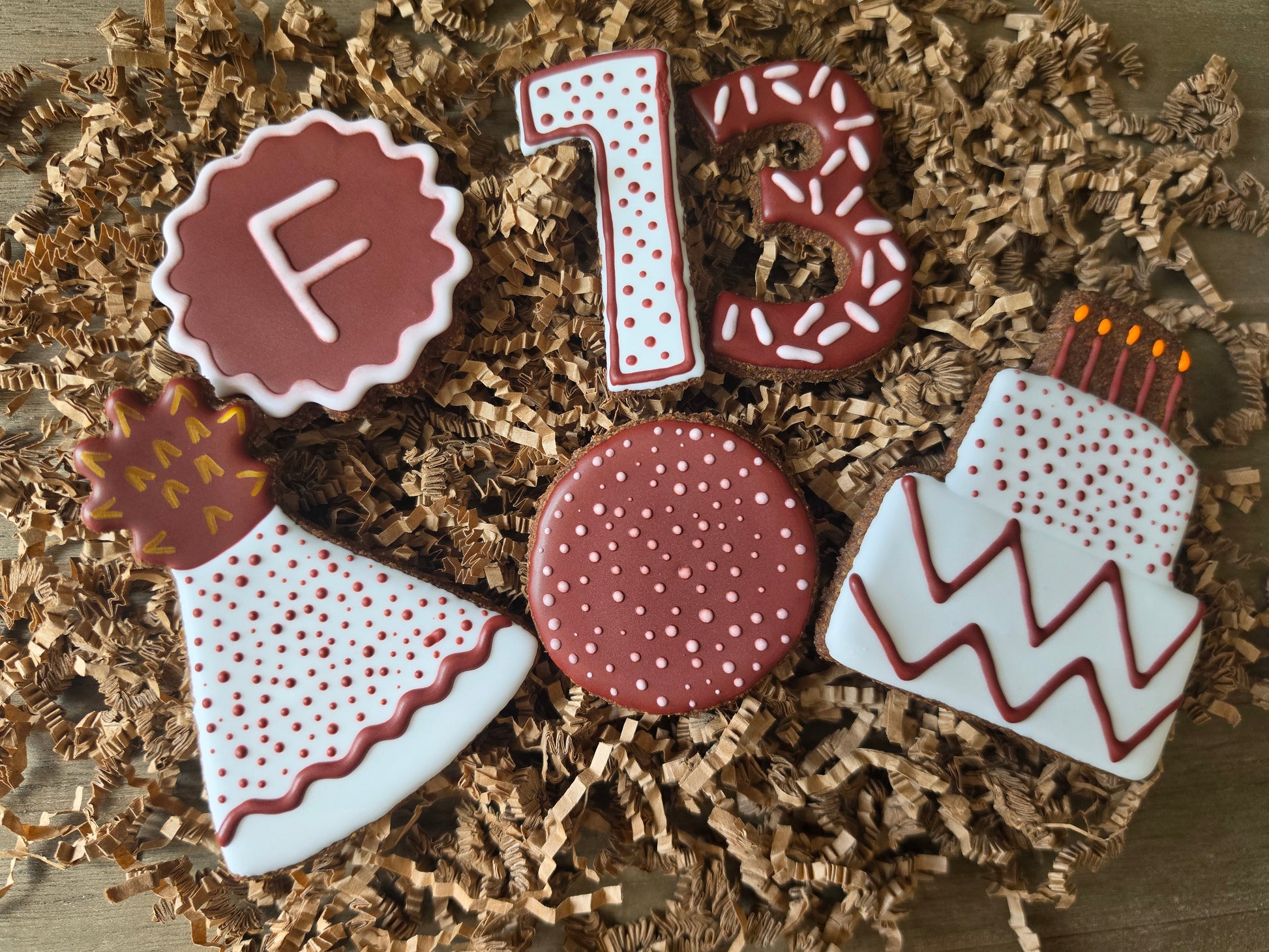 Decorative horse birthday cookies in burgundy and white