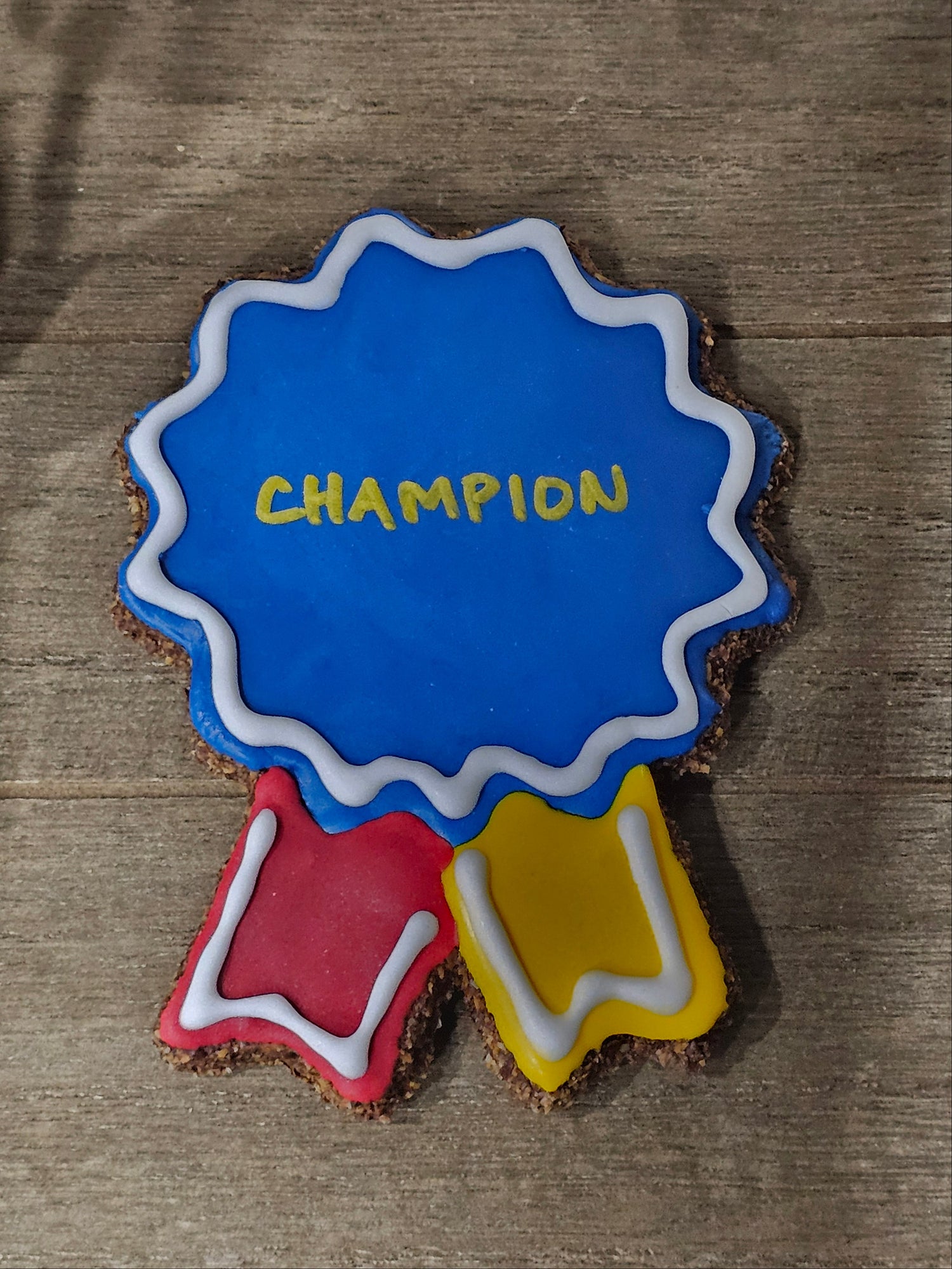 Horse cookie decorated as a Champion ribbon